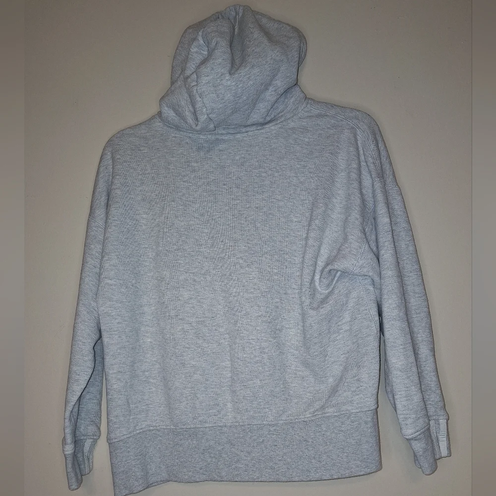 An Adidas hoodie in a mens size small. It's pre-loved and in great condition.